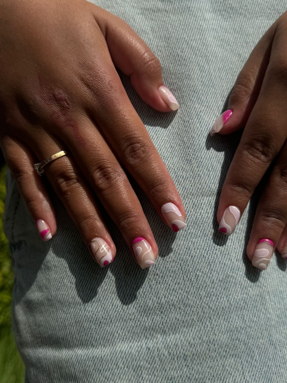Pink swirl nail art